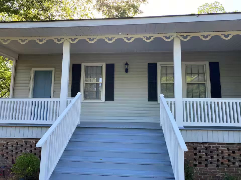 Front porch of the historic home in downtown Summit